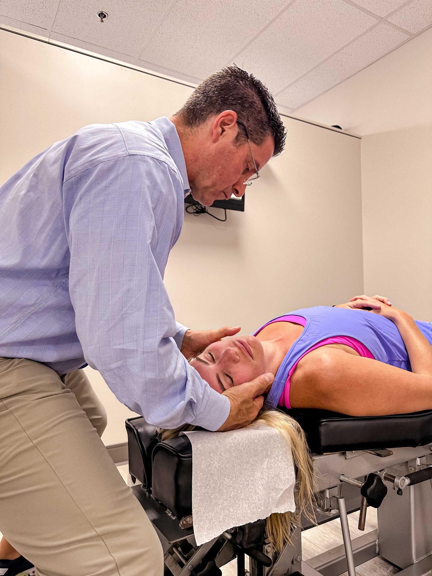 Dr. Dan Durrieu adjusting a patient at Family Health Chiropractic Center